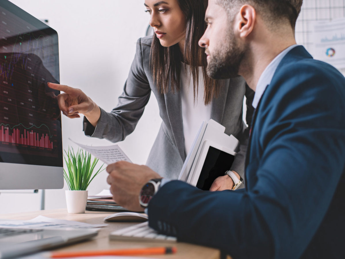 Selective,Focus,Of,Information,Security,Analysts,Working,With,Charts,On