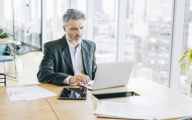 PLDE_Ciso_Man working with laptop